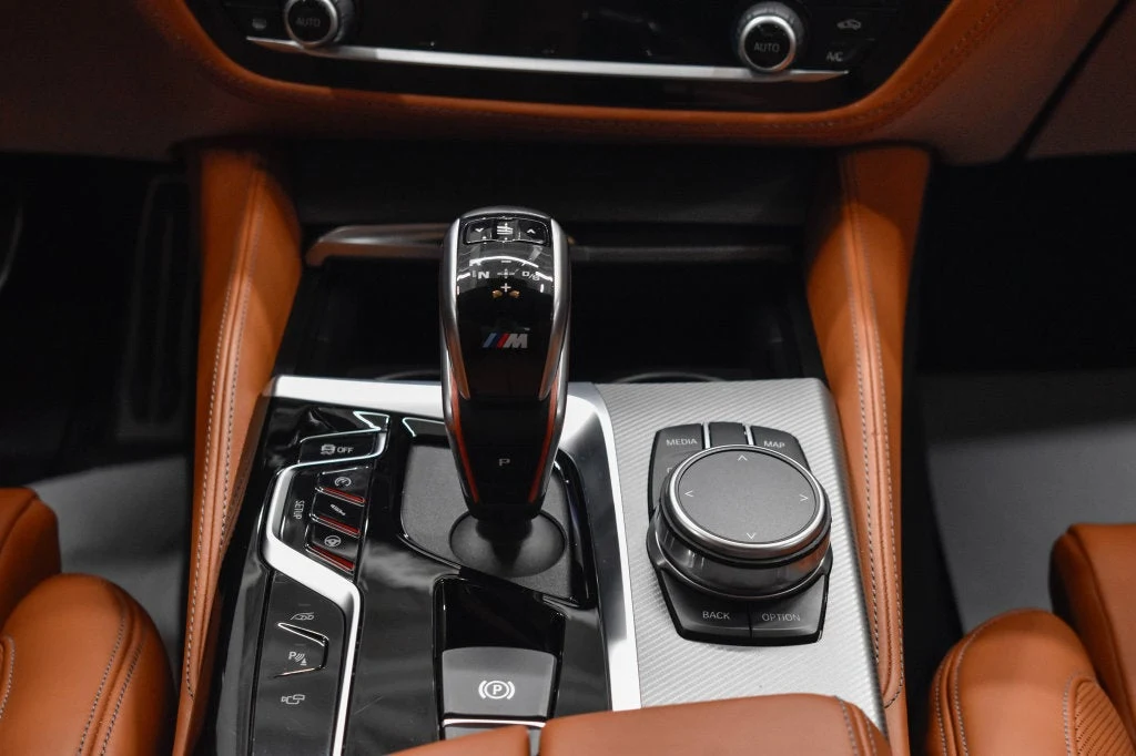 2019 BMW M5 Competition interior, center console, Aragon Brown