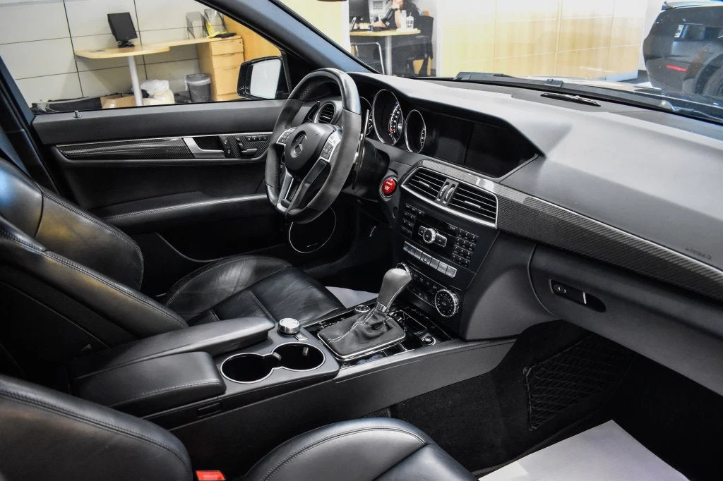 2013 Mercedes-Benz C 63 AMG Sedan interior, dashboard, Black