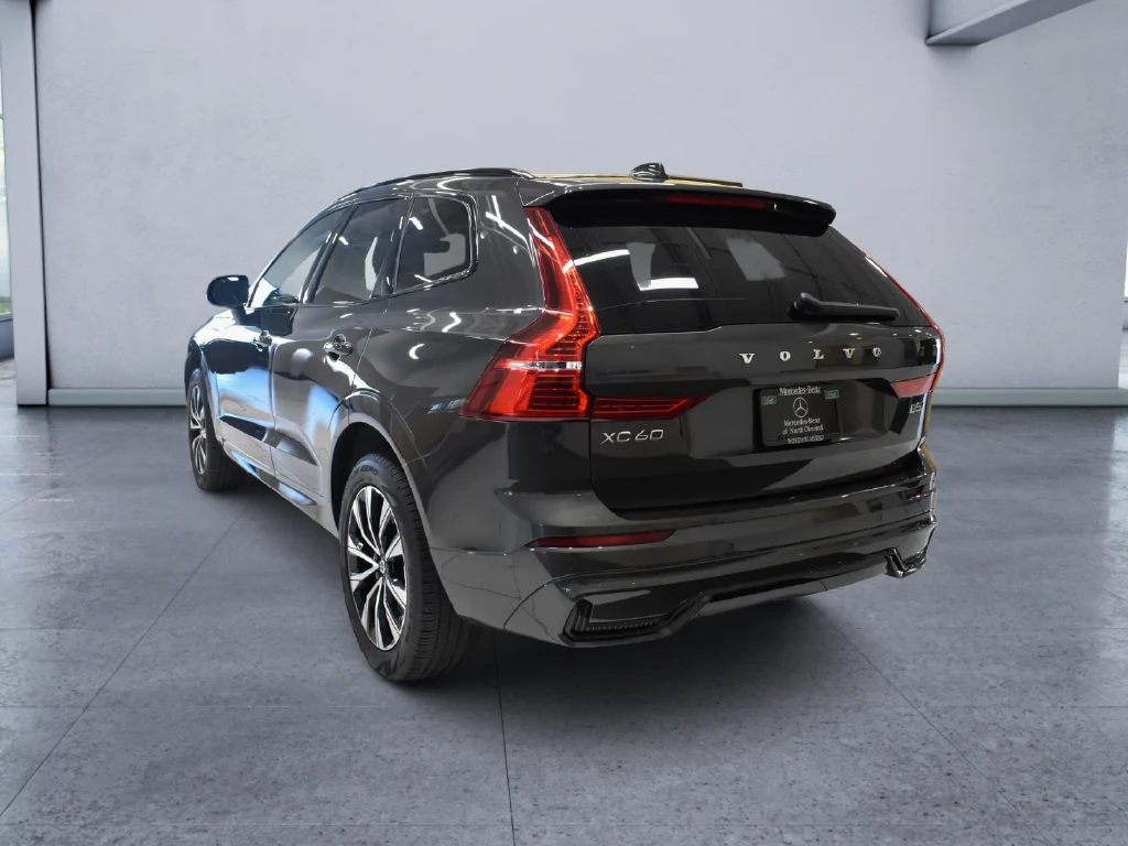 2024 Volvo XC60 B5 Core, rear three-quarter view, Grey