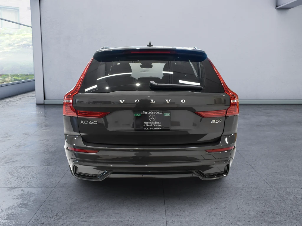2024 Volvo XC60 B5 Core, rear three-quarter view, Grey