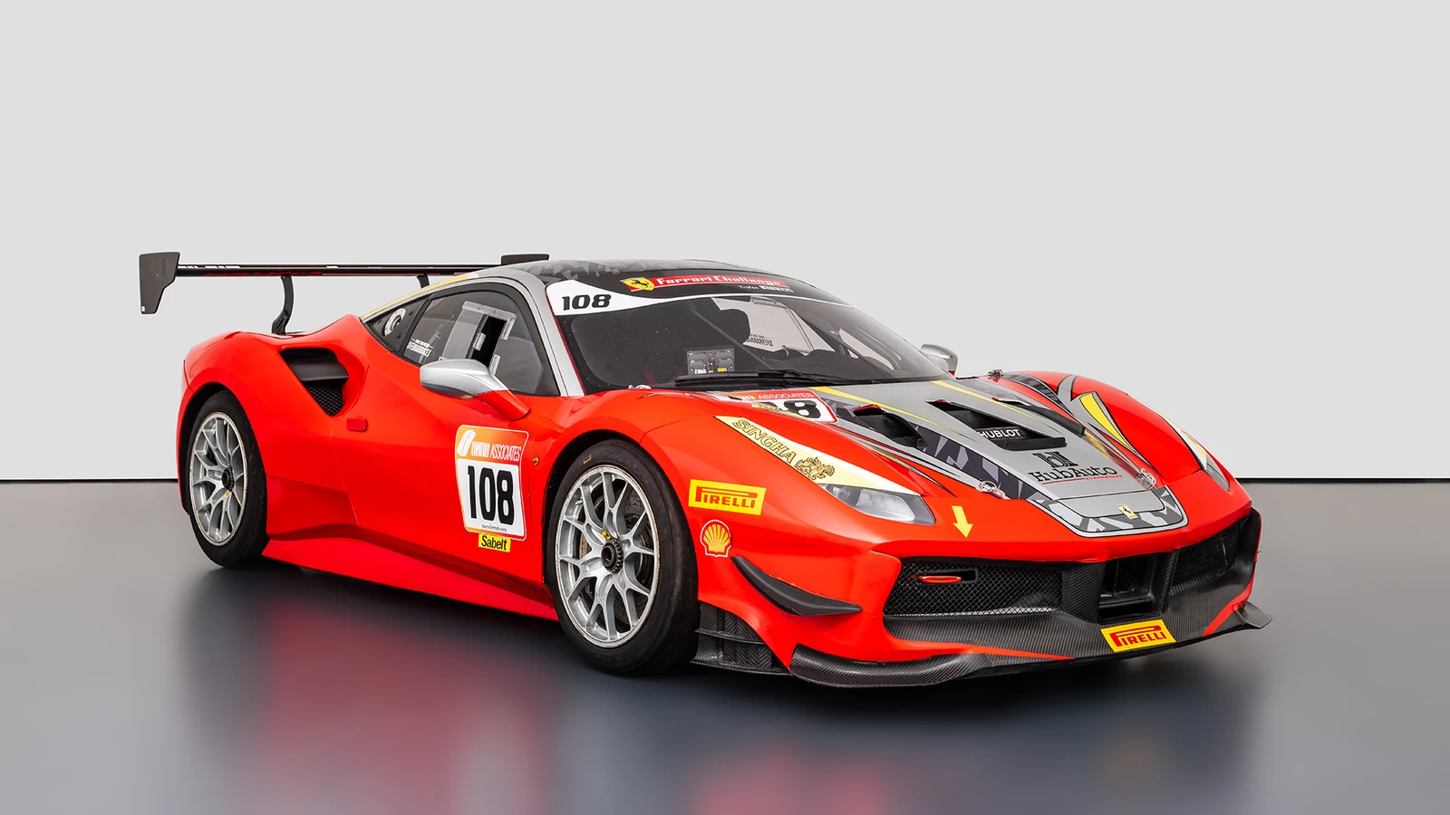 Red Ferrari 488 Challenge, full front three-quarter view