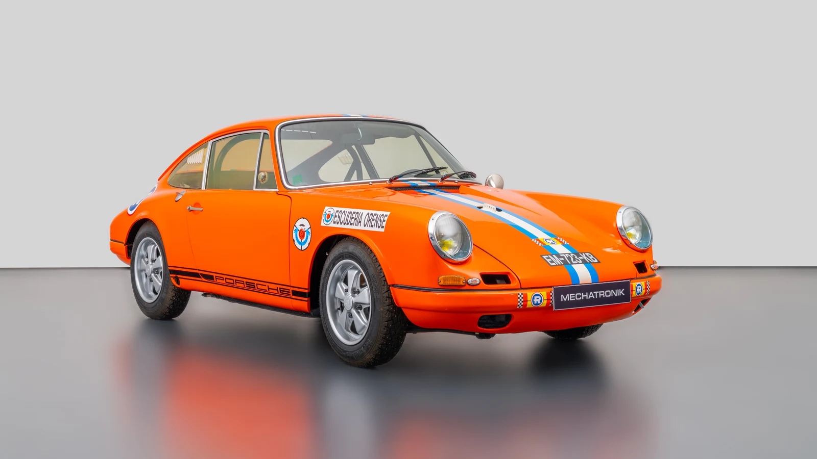Orange Porsche 911 R, full front three-quarter view