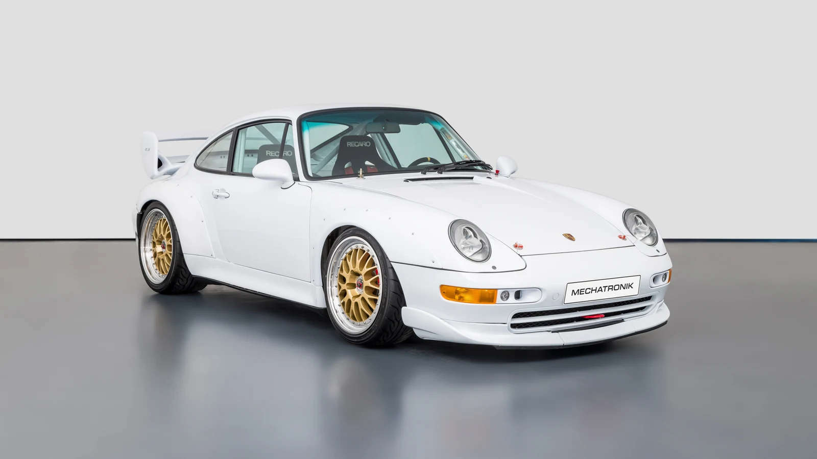Glacier White Porsche 911 3.8 RSR (993), full front three-quarter view