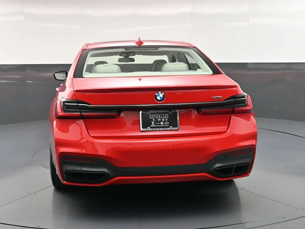 2022 BMW M760i xDrive, rear three-quarter view, Black