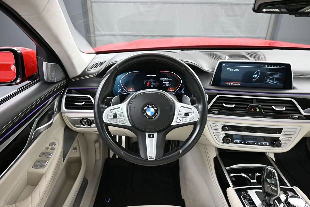 2022 BMW M760i xDrive interior, dashboard, Ivory White/Black