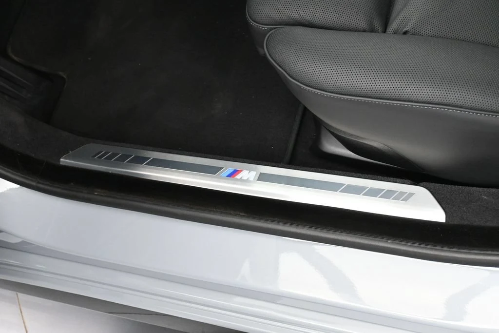 2025 BMW 760i xDrive interior, door sill, Black