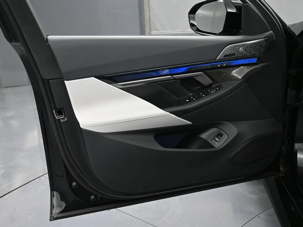2025 BMW M5 Touring interior, door panel, Silver/Black Merino Leather