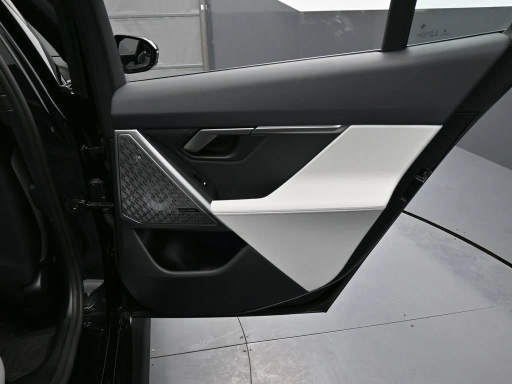 2025 BMW M5 Touring interior, door panel, Silver/Black Merino Leather