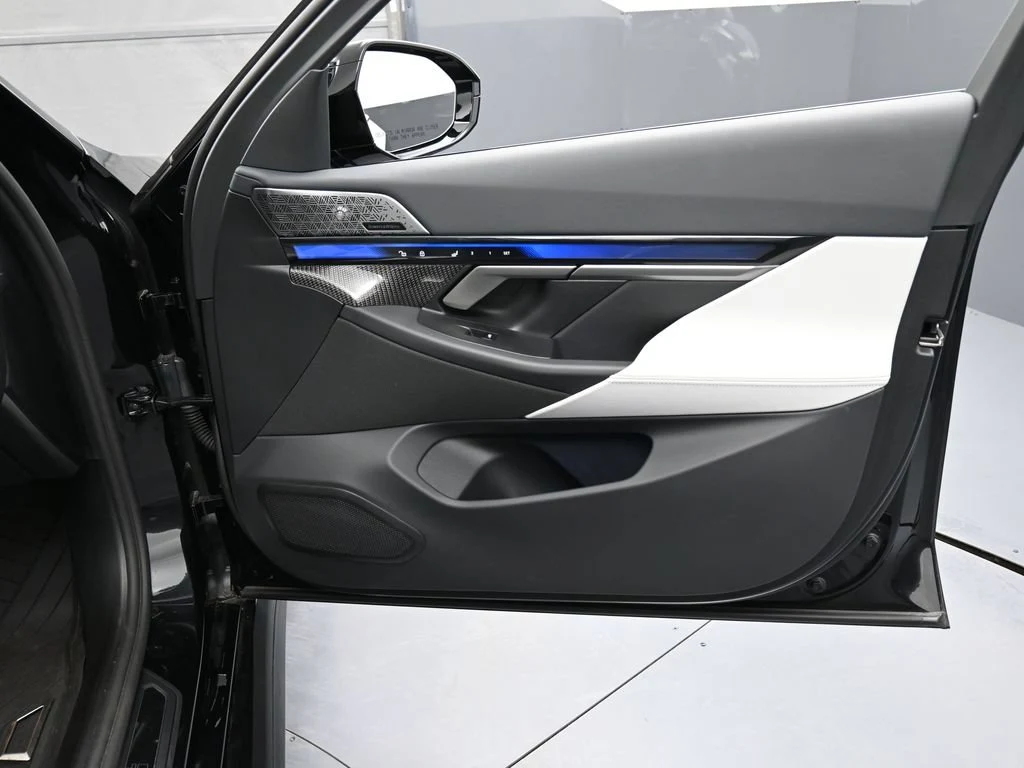 2025 BMW M5 Touring interior, door panel, Silver/Black Merino Leather