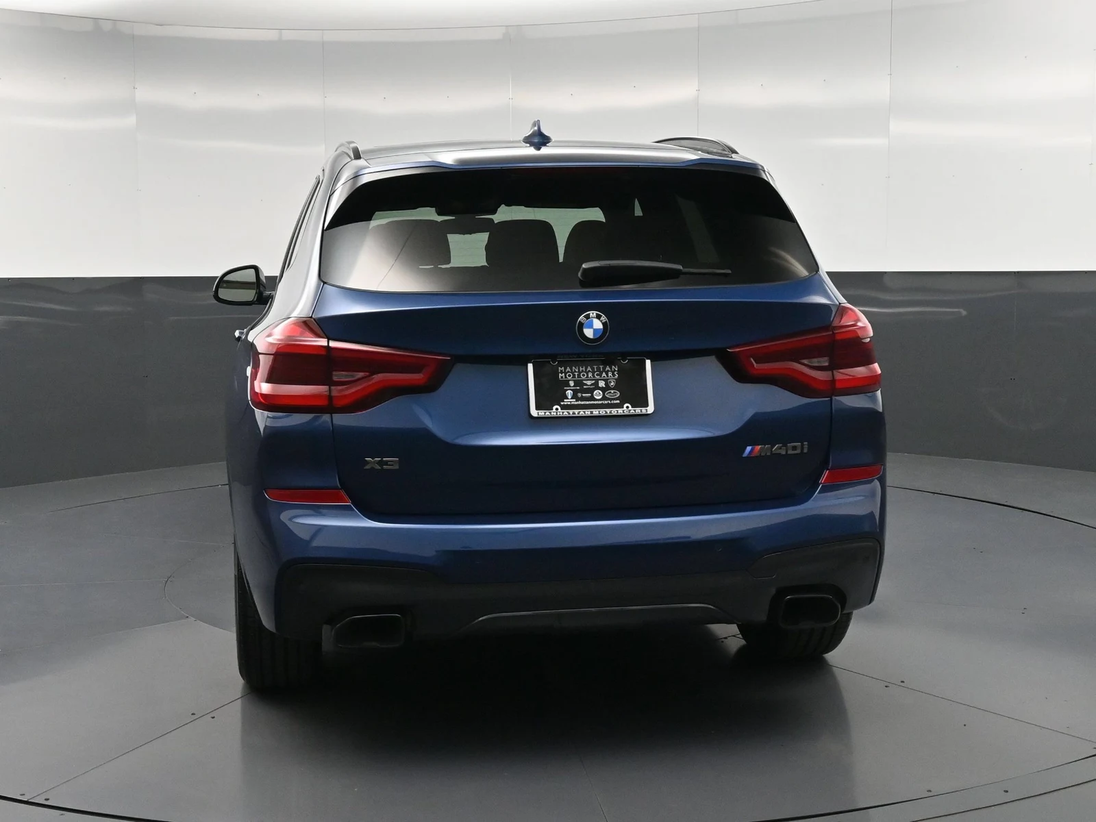 2019 BMW X3 M40i, rear three-quarter view, Blue