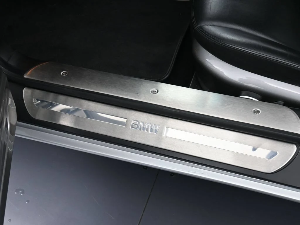 2001 BMW Z8 interior, door sill, Black/Black