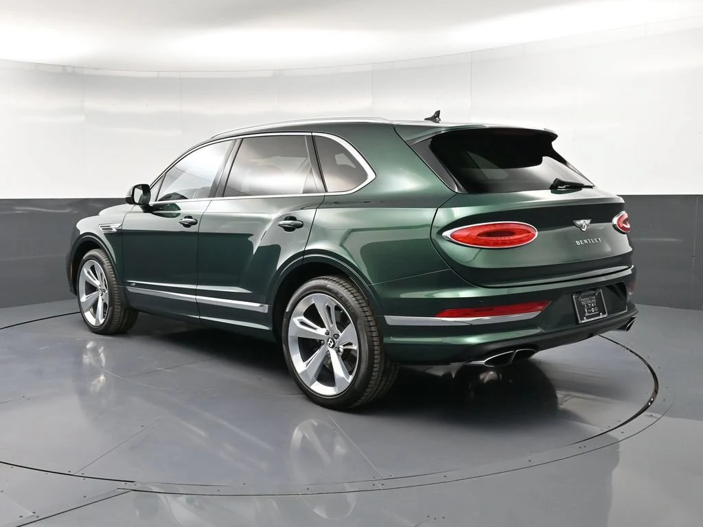 2022 Bentley Bentayga V8 First Edition, rear three-quarter view, Green