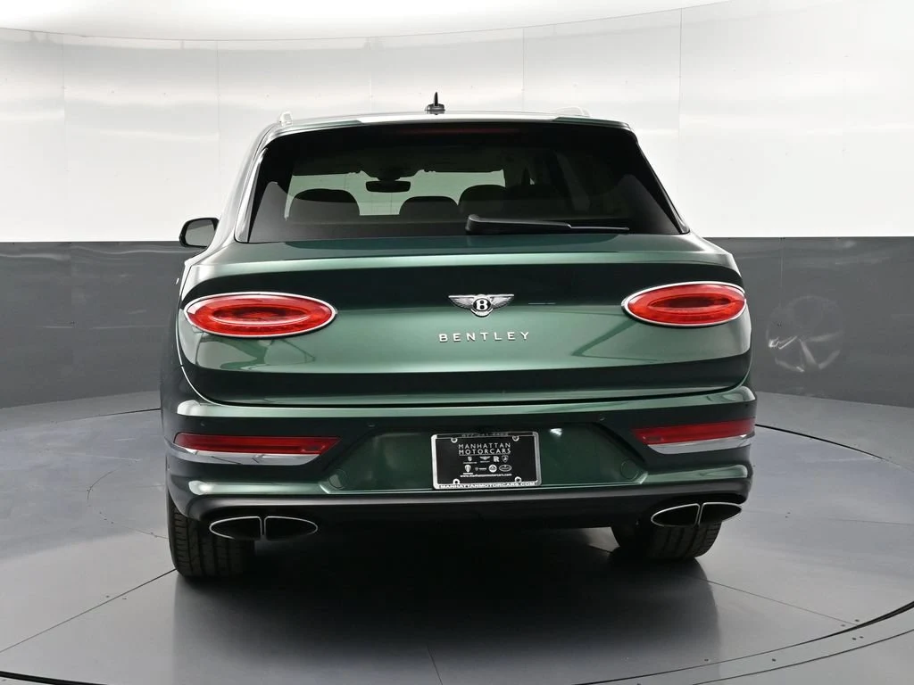 2022 Bentley Bentayga V8 First Edition, rear three-quarter view, Green