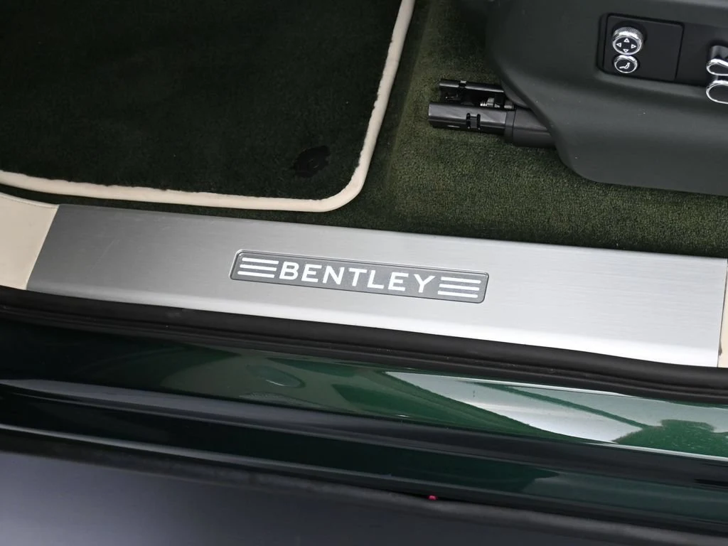 2022 Bentley Bentayga V8 First Edition interior, door sill, Linen