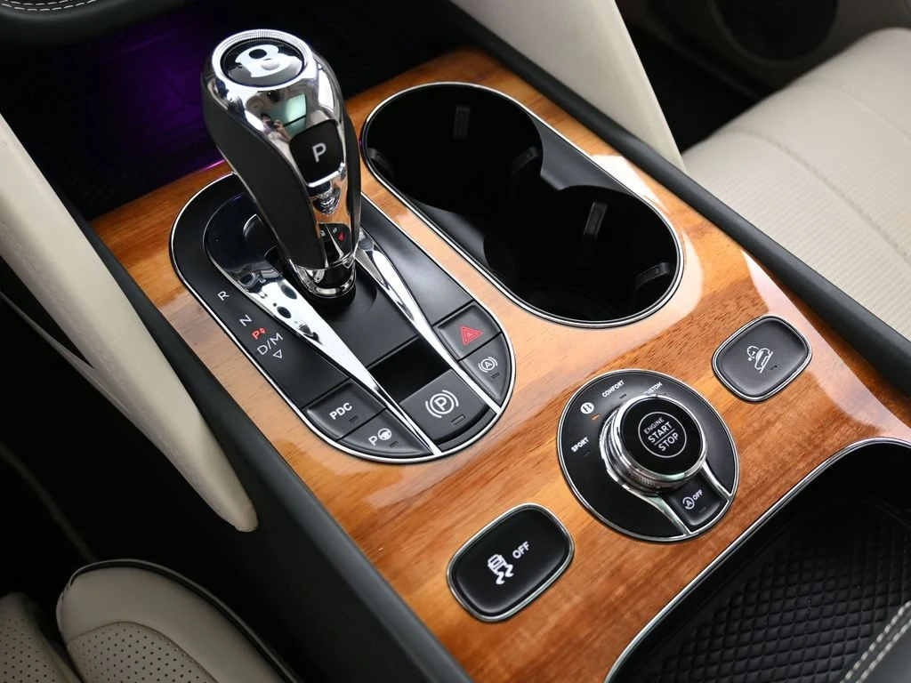 2022 Bentley Bentayga V8 First Edition interior, center console, Linen