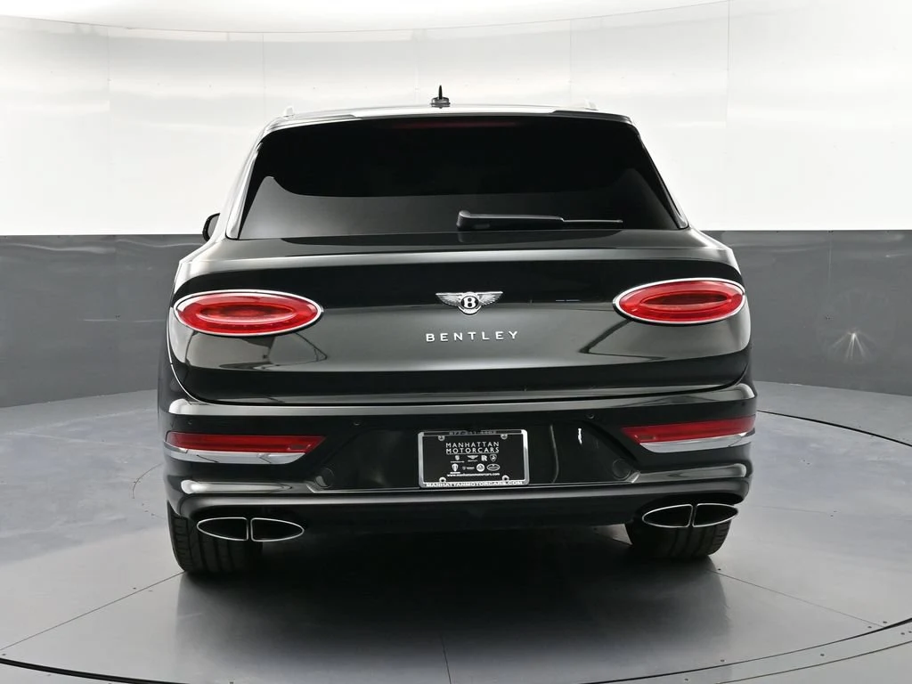 2024 Bentley Bentayga Azure, rear three-quarter view, Blue