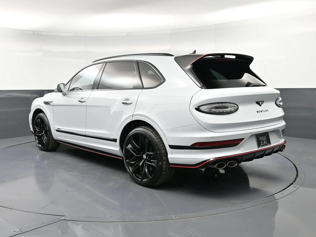 2026 Bentley Bentayga Speed, rear three-quarter view, Silver