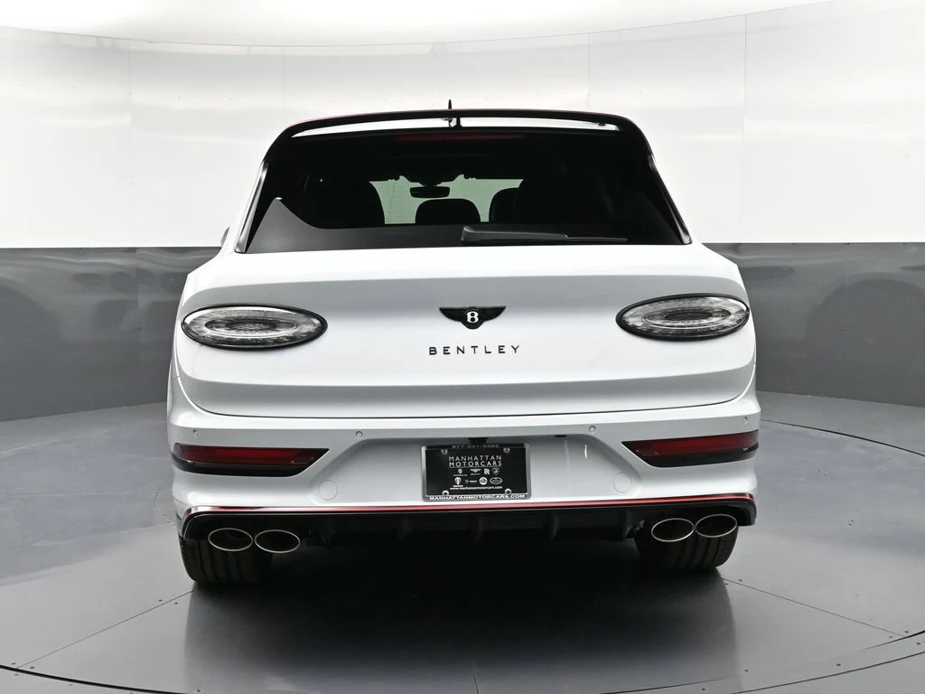 2026 Bentley Bentayga Speed, rear three-quarter view, Silver
