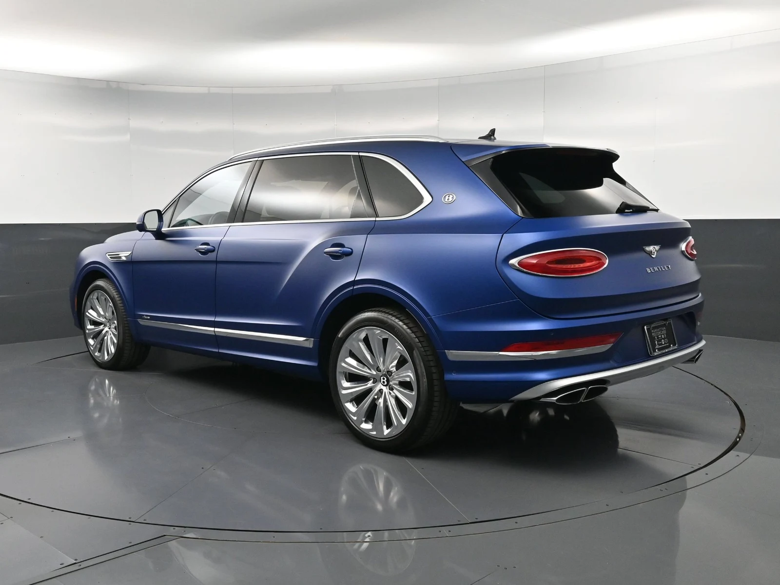 2025 Bentley Bentayga EWB Azure, rear three-quarter view, Blue