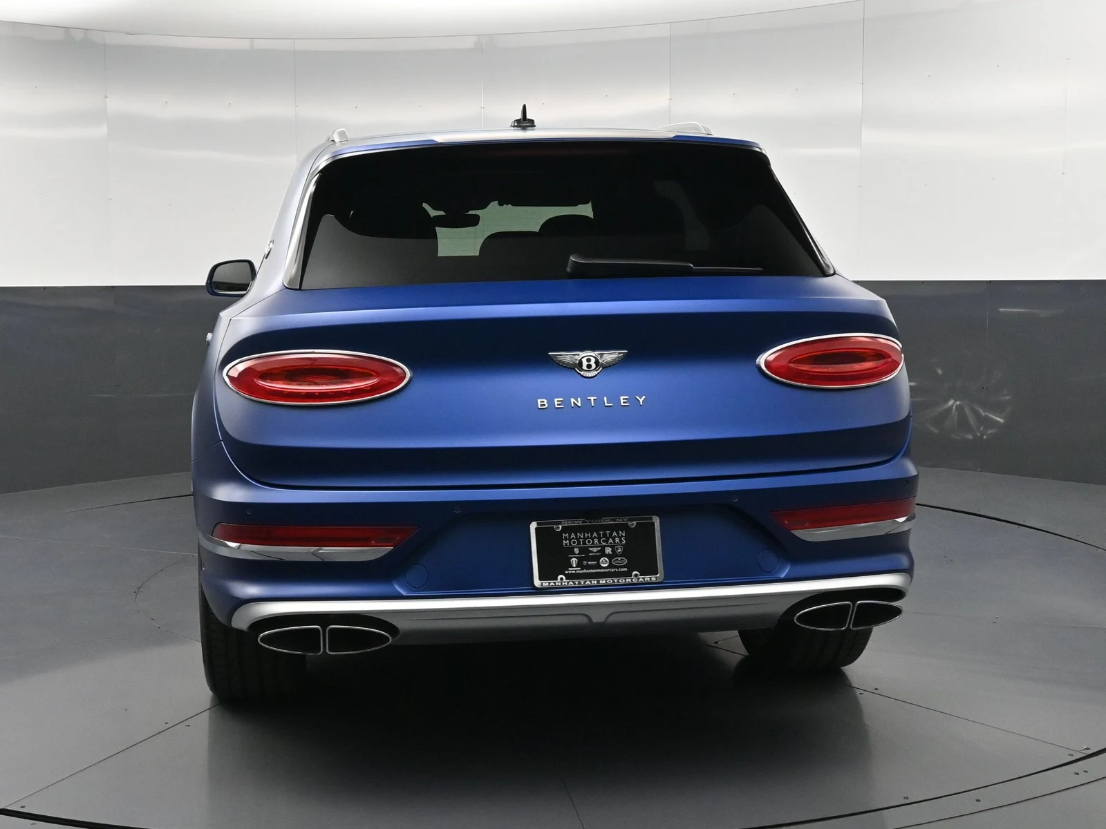2025 Bentley Bentayga EWB Azure, rear three-quarter view, Blue