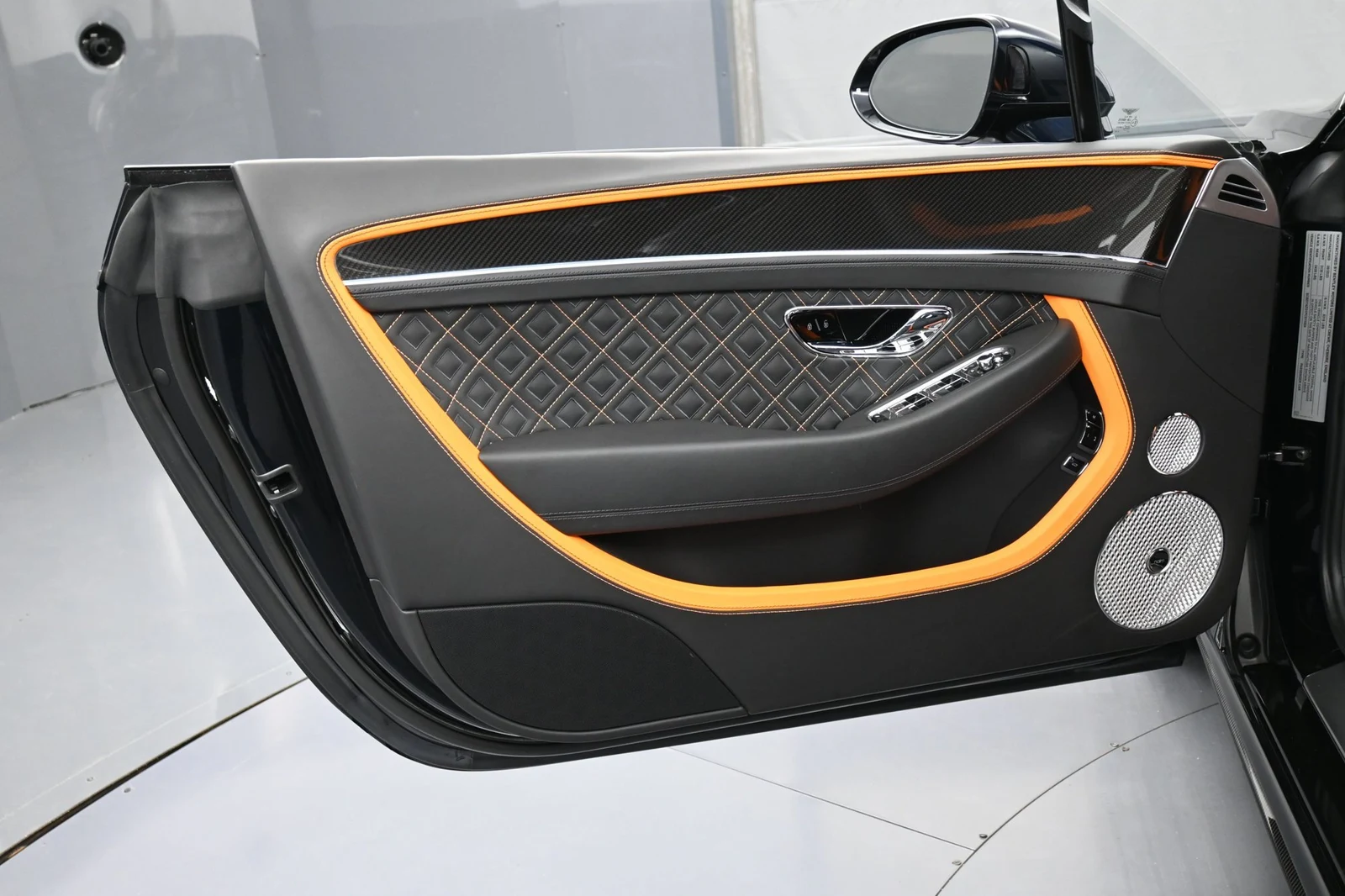 2023 Bentley Continental GTC Speed interior, door panel, Mandarin by Mulliner
