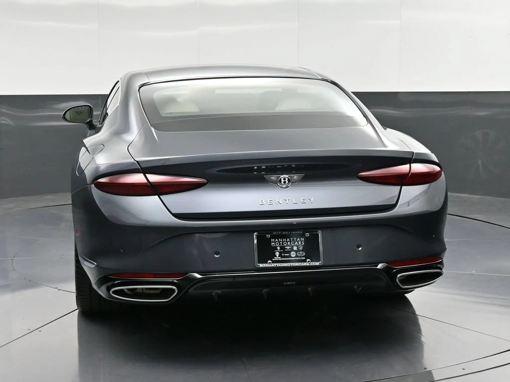 2026 Bentley Continental GT, rear three-quarter view, Blue