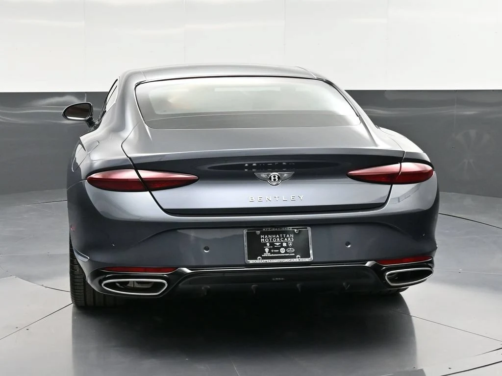 2026 Bentley Continental GT, rear three-quarter view, Blue