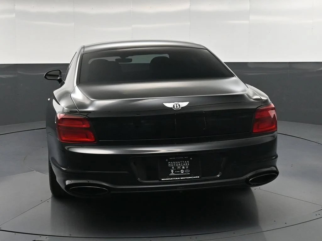 2024 Bentley Flying Spur Speed, rear three-quarter view, Black