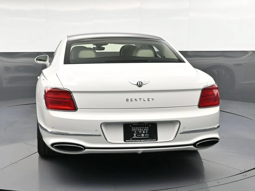 2026 Bentley Flying Spur, rear three-quarter view, White