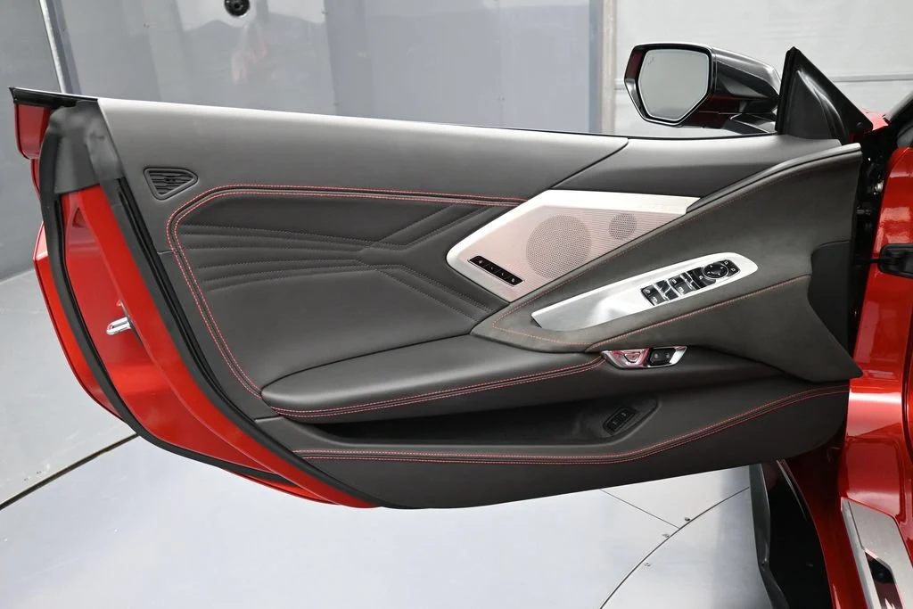 2025 Chevrolet Corvette Z06 Convertible interior, door panel, Jet Black Interior/Adrenaline Red Seats