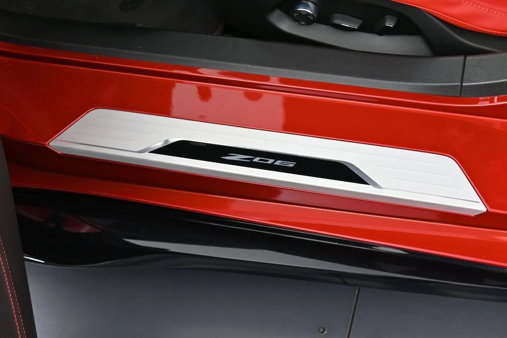 2025 Chevrolet Corvette Z06 Convertible interior, door sill, Jet Black Interior/Adrenaline Red Seats