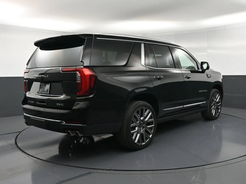 2026 GMC Yukon Denali Ultimate, rear three-quarter view, Black