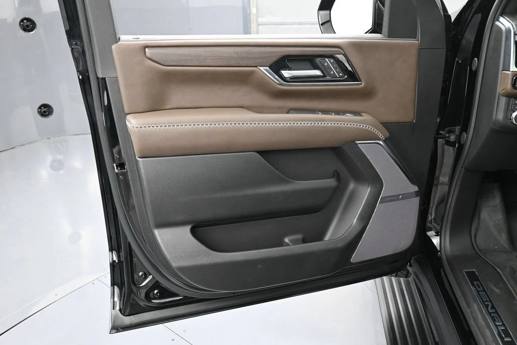 2026 GMC Yukon Denali Ultimate interior, door panel, Woodland Mahogany