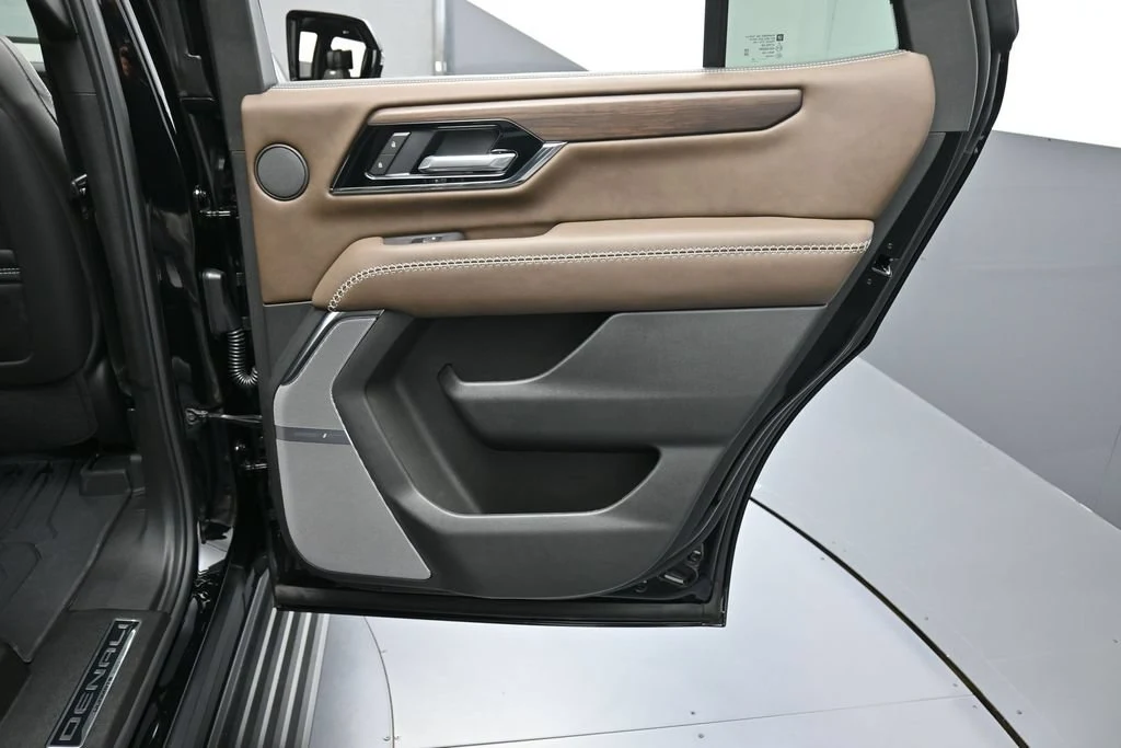 2026 GMC Yukon Denali Ultimate interior, door panel, Woodland Mahogany