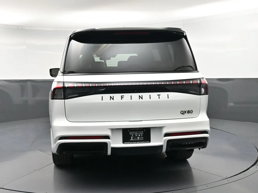 2025 Infiniti QX80 Sensory, rear three-quarter view, White