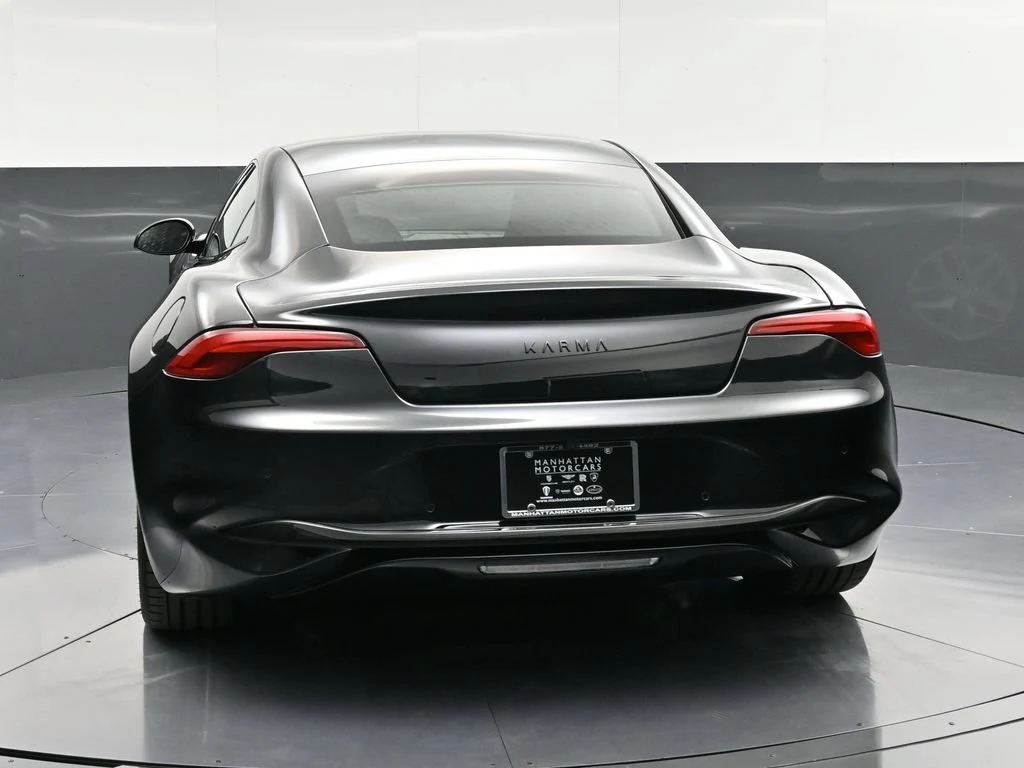 2025 Karma Revero, rear three-quarter view, Black