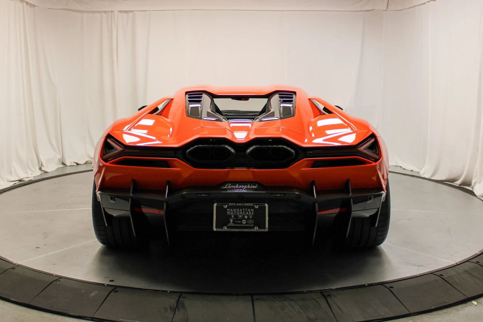 2025 Lamborghini Revuelto, rear three-quarter view, Orange