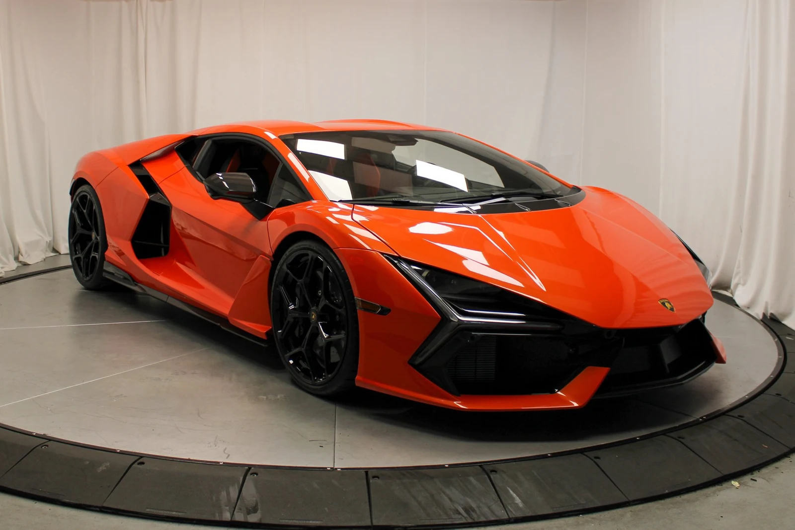 2025 Lamborghini Revuelto for sale, front three-quarter view, Orange