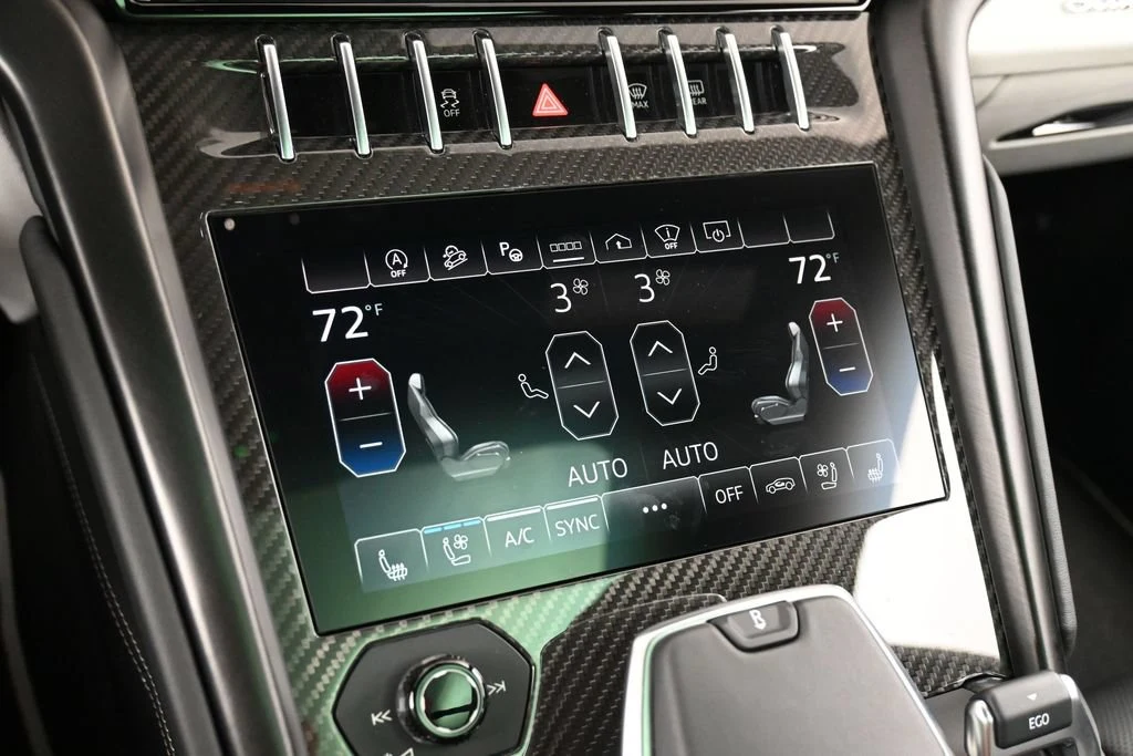 2024 Lamborghini Urus S interior, center console, Nero Ade/Bianco Leda