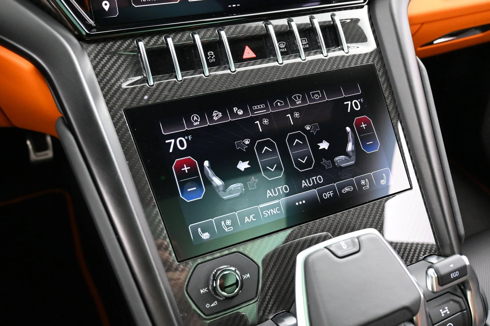 2024 Lamborghini Urus S interior, center console, Nero Ade/Arancio Leonis