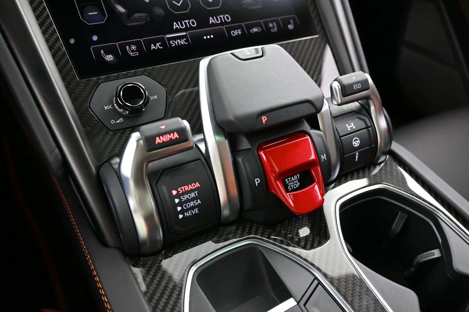 2024 Lamborghini Urus S interior, center console, Nero Ade/Arancio Leonis