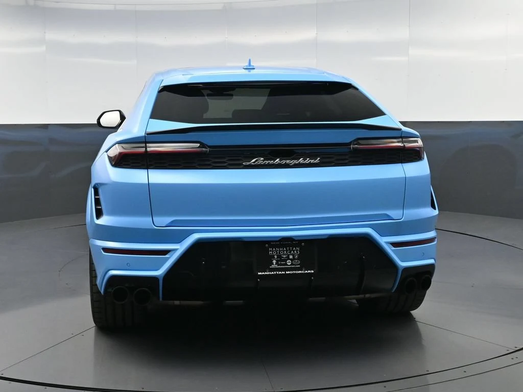 2025 Lamborghini Urus SE, rear three-quarter view, Blue