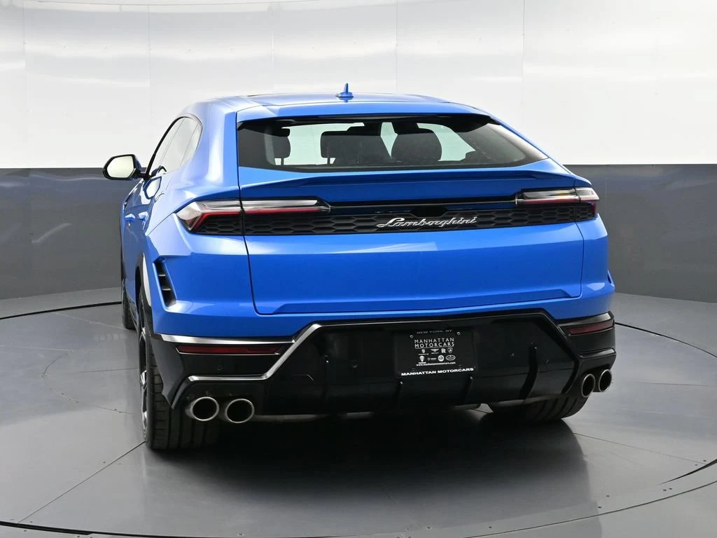2025 Lamborghini Urus SE, rear three-quarter view, Blue
