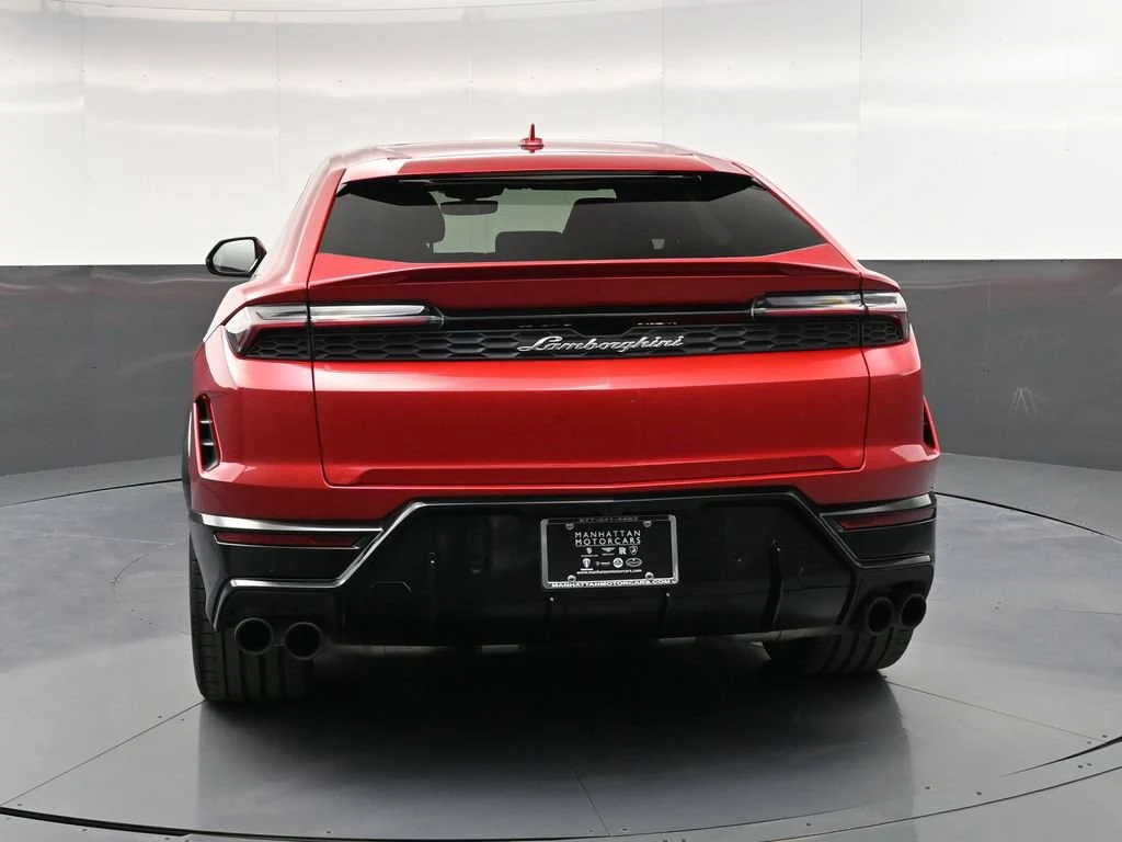 2026 Lamborghini Urus SE, rear three-quarter view, Red