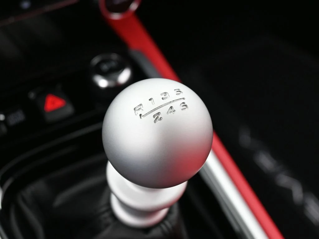 2025 Lotus Emira V6 interior, center console, Red Leather
