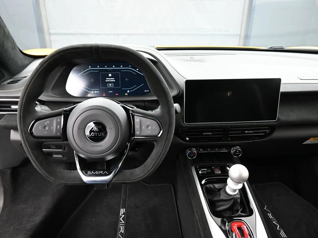 2025 Lotus Emira V6 interior, dashboard, Black Alcantara with Yellow Stitch