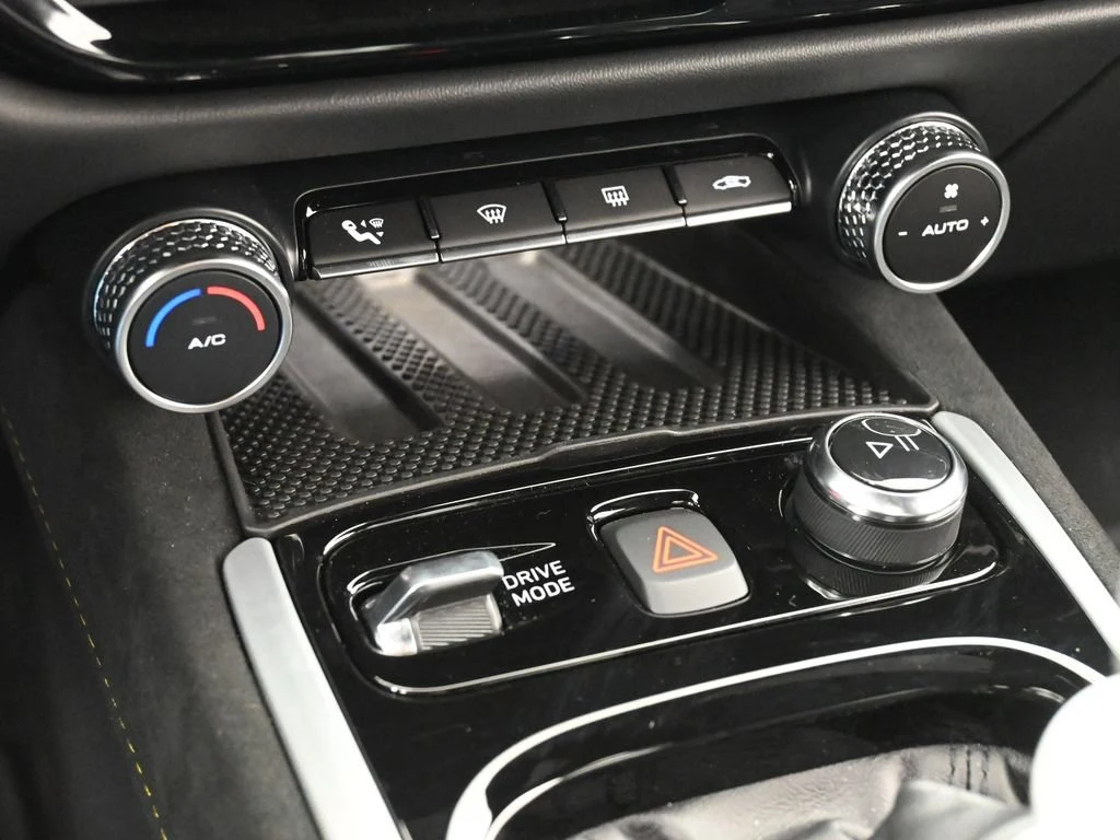 2025 Lotus Emira V6 interior, center console, Black Alcantara with Yellow Stitch