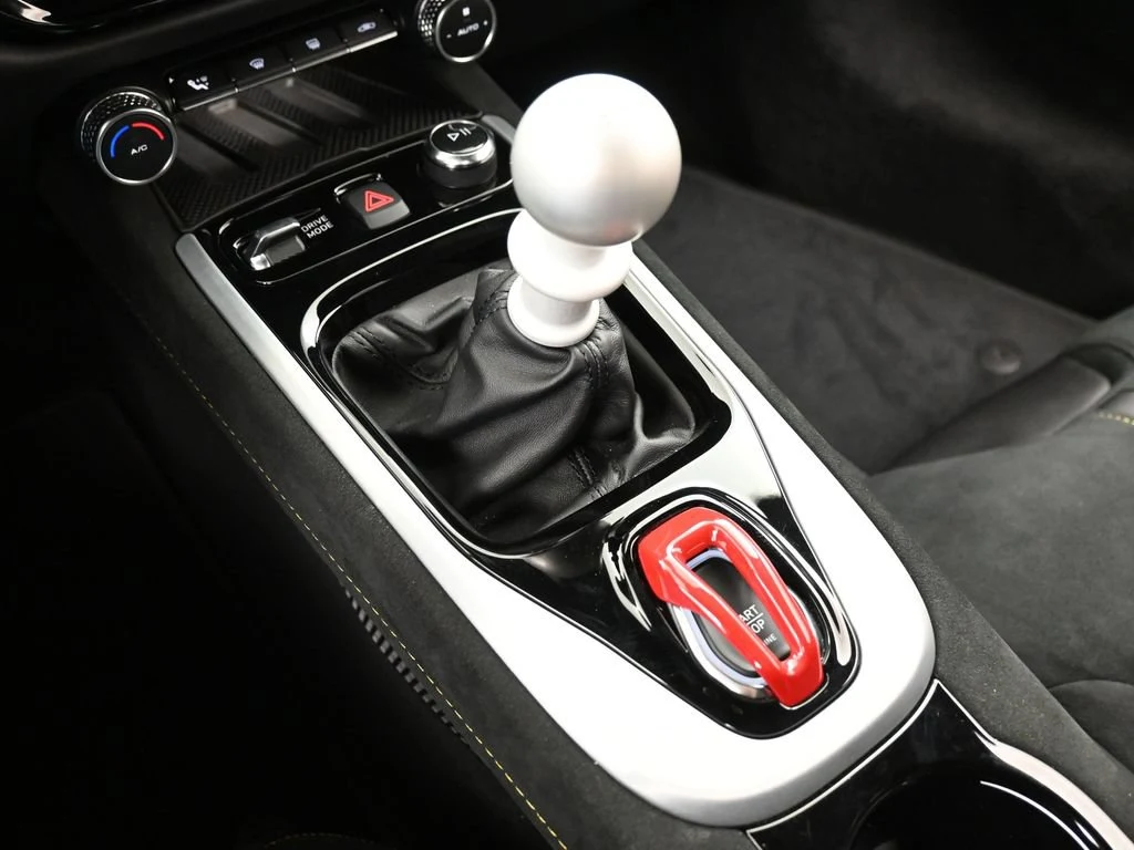 2025 Lotus Emira V6 interior, center console, Black Alcantara with Yellow Stitch