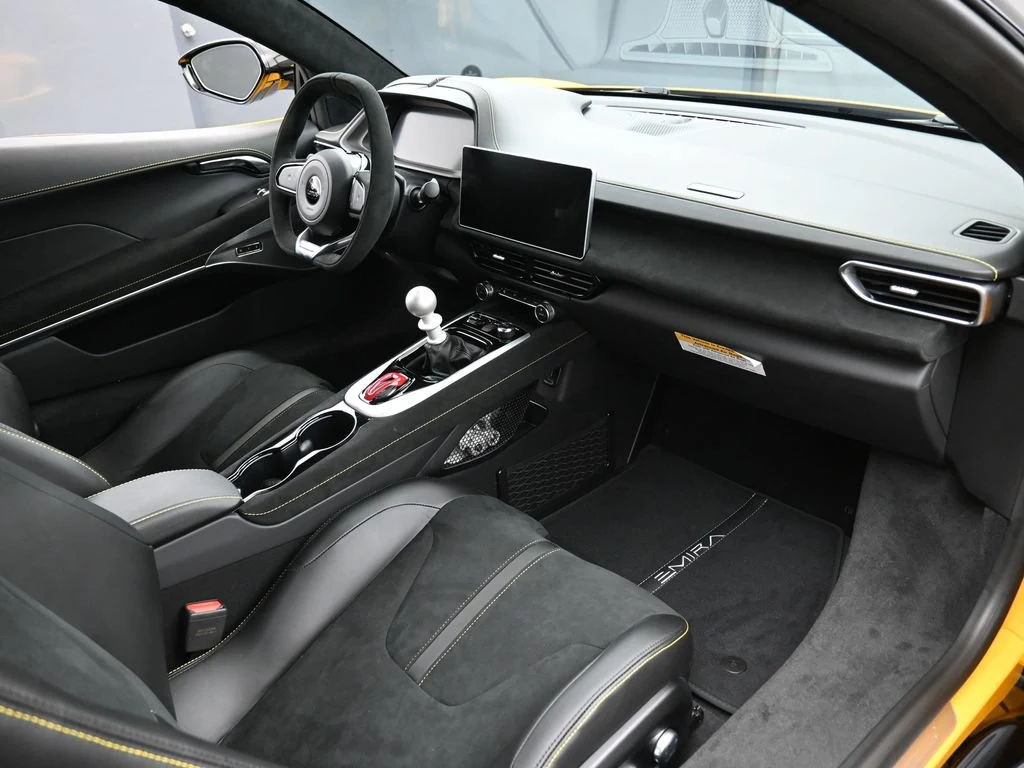 2025 Lotus Emira V6 interior, Black Alcantara with Yellow Stitch
