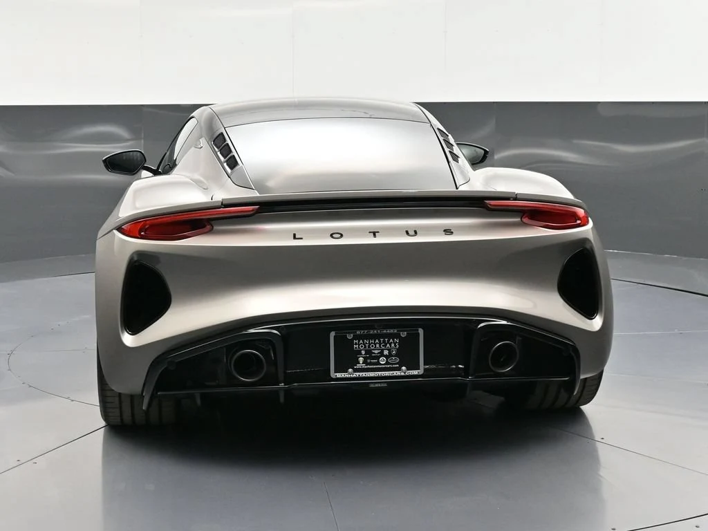 2026 Lotus Emira Turbo SE, rear three-quarter view, Grey
